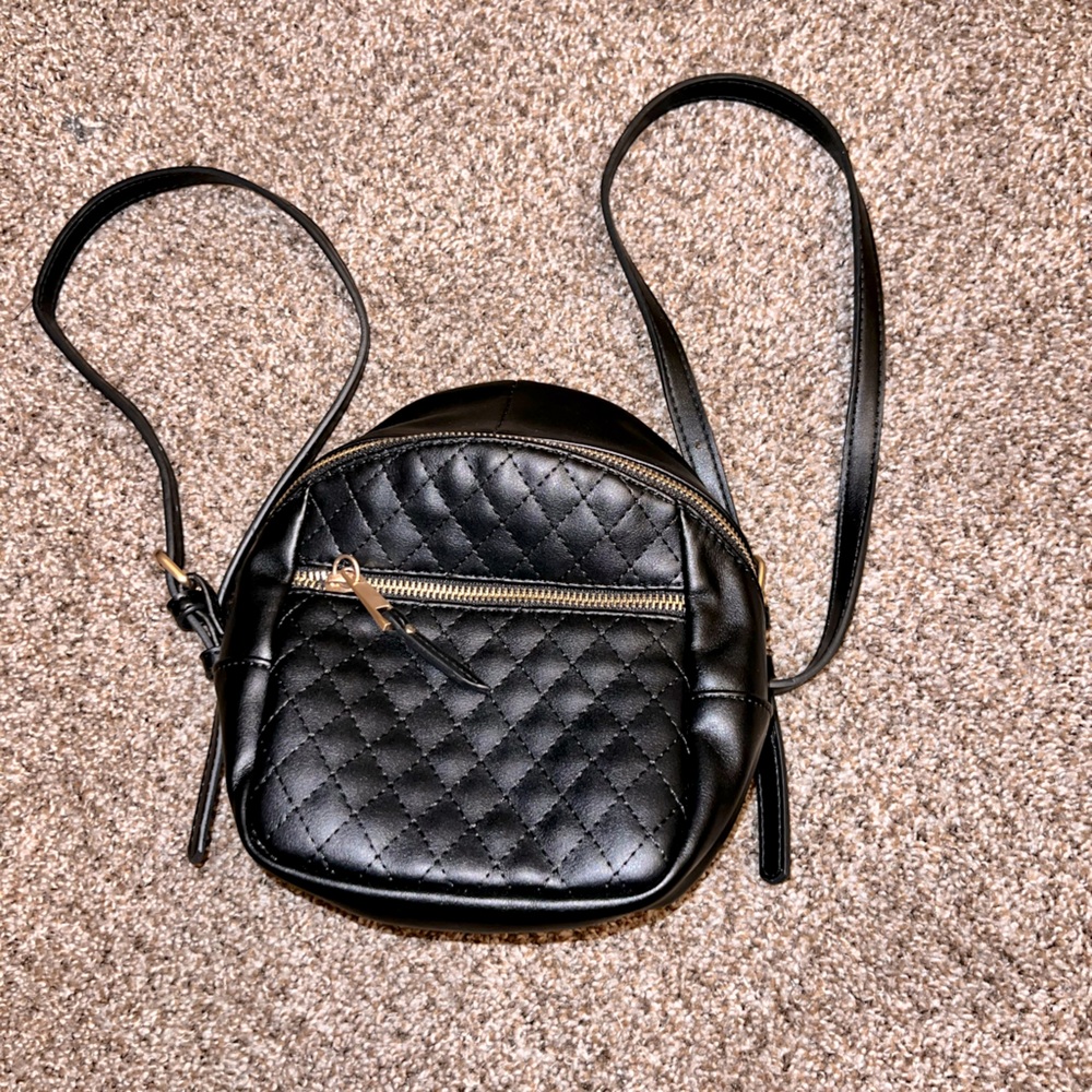 8in black faux leather backpack